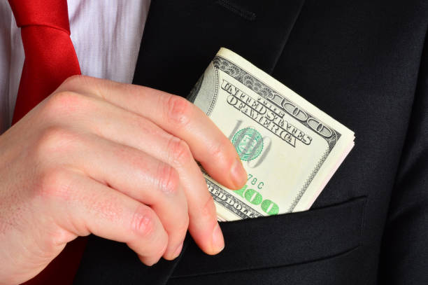 istock Businessman Holding Dollars 844149036