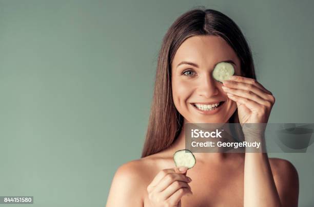 Young Woman Beauty Stock Photo - Download Image Now - Cucumber, Eye, Tired