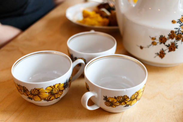istock Vintage porcelain tea or coffee cup on table 844152274