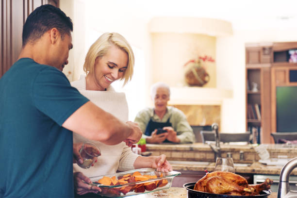 istock Couple prepararing thanksgiving dinner 844152758