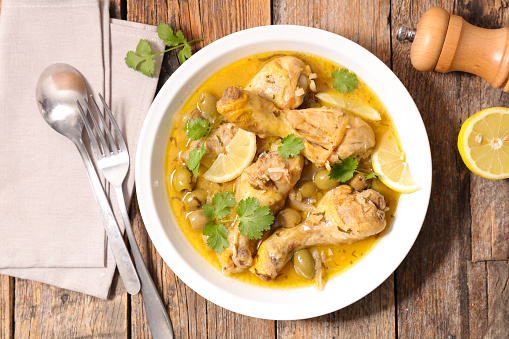 chicken leg cooked with lemon,coriander and olive