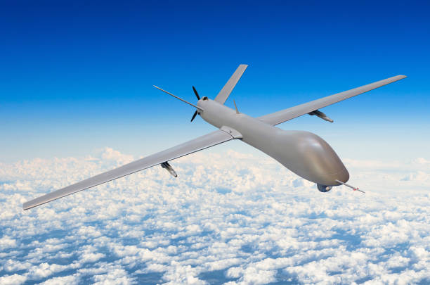 istock Unmanned military aircraft background blue sky clouds 844160954