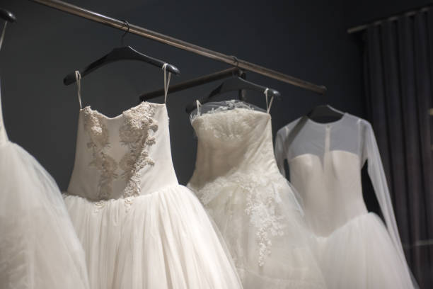 istock Selection of handmade white wedding gowns 844161262