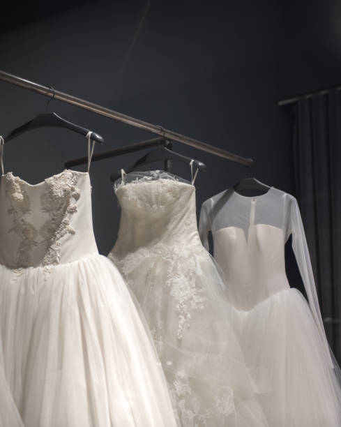 istock Selection of handmade white wedding gowns 844161264