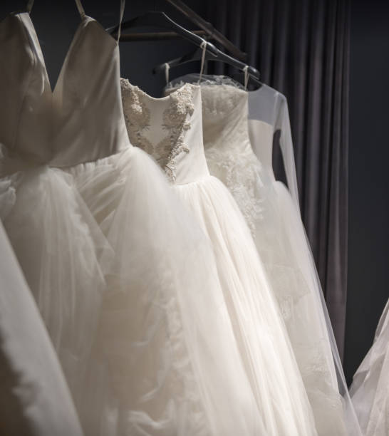 istock Selection of handmade white wedding gowns 844161270