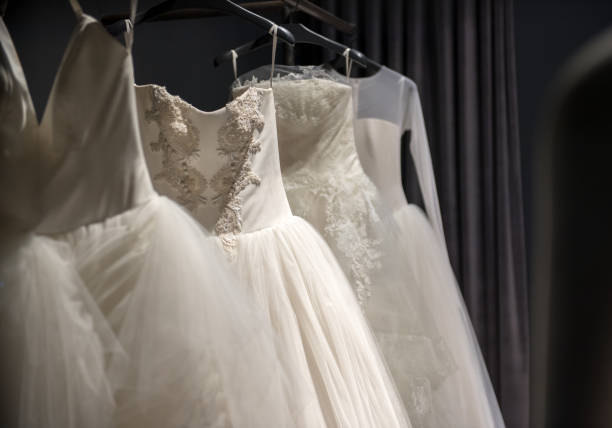 istock Selection of handmade white wedding gowns 844161274