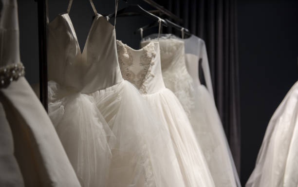 istock Selection of handmade white wedding gowns 844161300