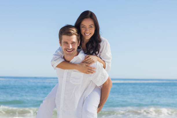 istock Happy couple smiling at camera 844167074