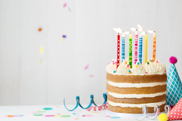 Birthday cake Birthday cake with colorful candles at a birthday party gateau stock pictures, royalty-free photos & images