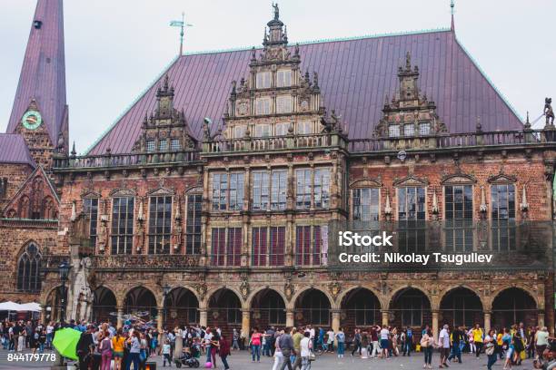 View Of Bremen Market Square With Town Hall Roland Statue And Crowd Of People Historical Center Germany Stock Photo - Download Image Now