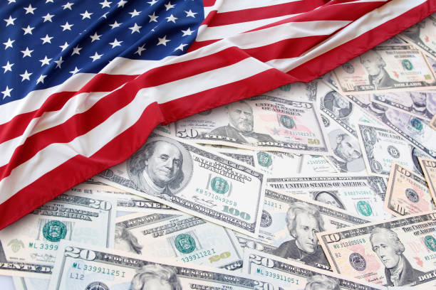 USA finance American flag on assorted banknotes new zealand dollar photos stock pictures, royalty-free photos & images