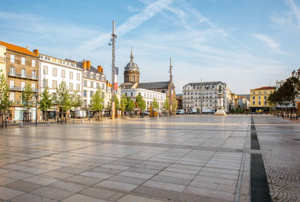 Clermont-Ferrand city in France View on the Jaude square during the morning light in Clermont-Ferrand city in central France town square stock pictures, royalty-free photos & images
