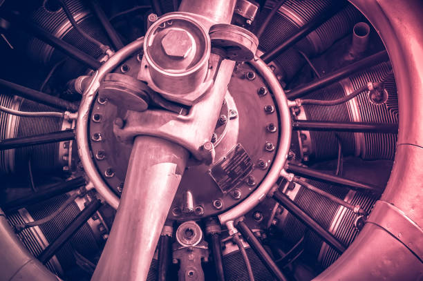 istock red toned vintage aircraft engine and propeller closeup 844198272