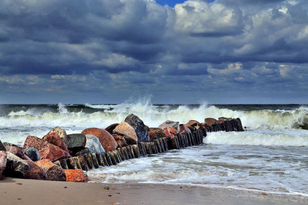 istock Stormy Baltic sea and old breakwater 844198782