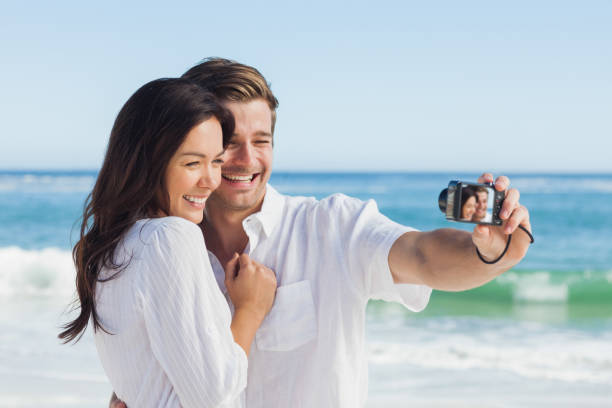 istock Happy couple taking a photo 844201948