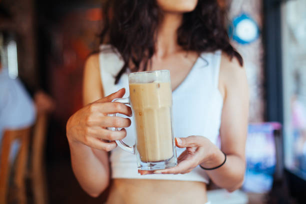 istock Hipster Woman Drinking Iced Coffee 844206434