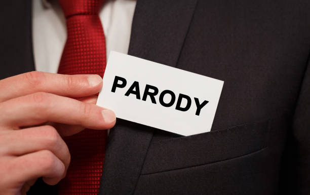 istock Businessman putting a card with text Parody in the pocket 844206476