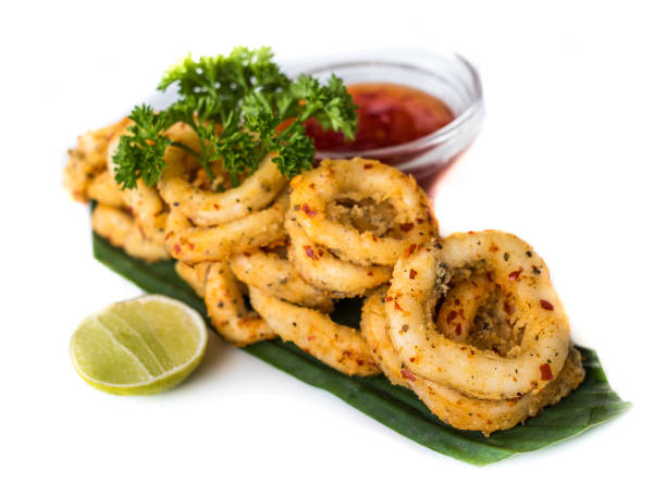 Deep fried calamari rings with sauce bowl