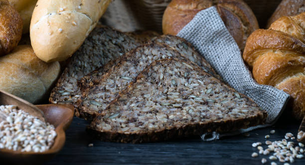 istock Different bread and bread slices, food background. 844212348