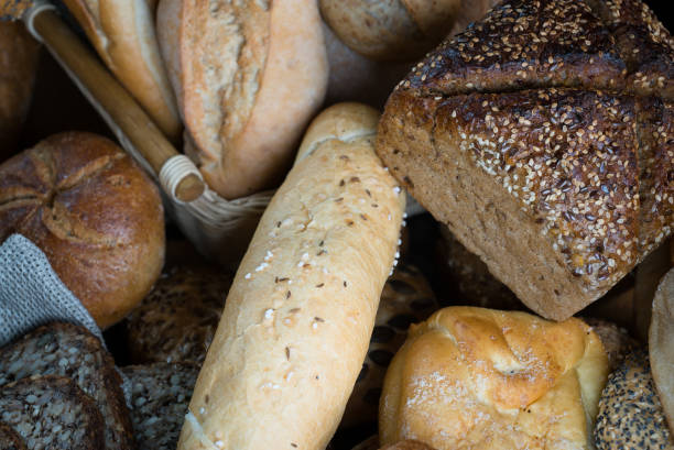 istock Different bread and bread slices, food background. 844212358