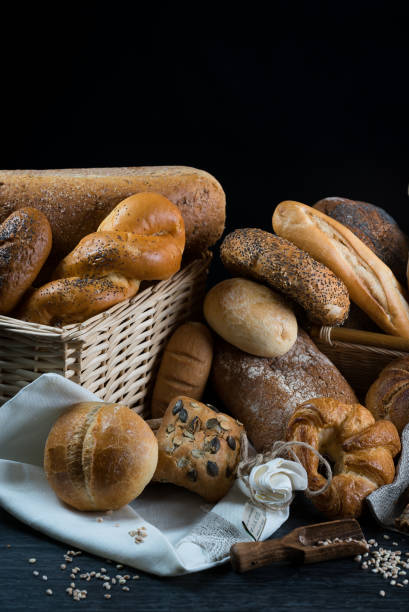 istock Different bread and bread slices, food background. 844212472
