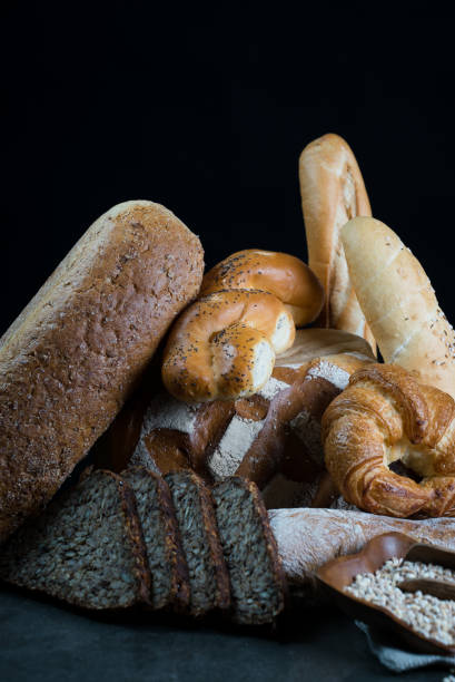 istock Different bread and bread slices, food background. 844212814
