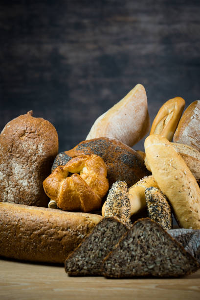 istock Different bread and bread slices, food background. 844213034
