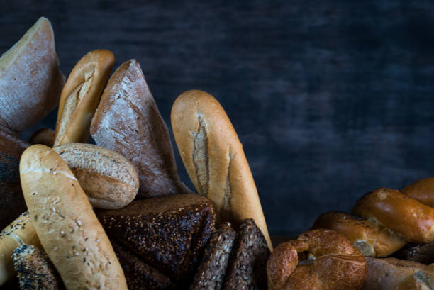 istock Different bread and bread slices, food background. 844213182