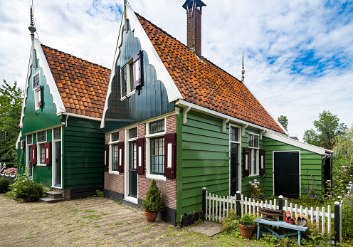 Zaanse Schans, Netherlands - July 27, 2017: Typical Dutch countryside houses in Zaanse Schans, Netherlands