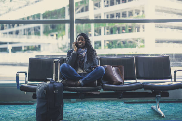 istock Young woman at airport 844220096