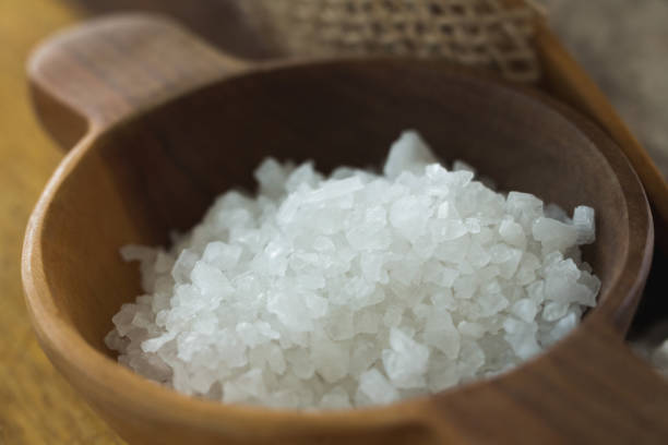 istock Sea salt in wooden bowl 844220146