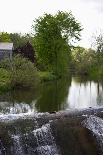 Rich springtime colors emerge at the old Dexter Grist Mill (1637)  in Sandwich, Massachusetts on a bright May morning.