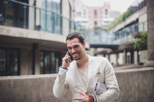 istock Gentleman in suit on mobile 844223130