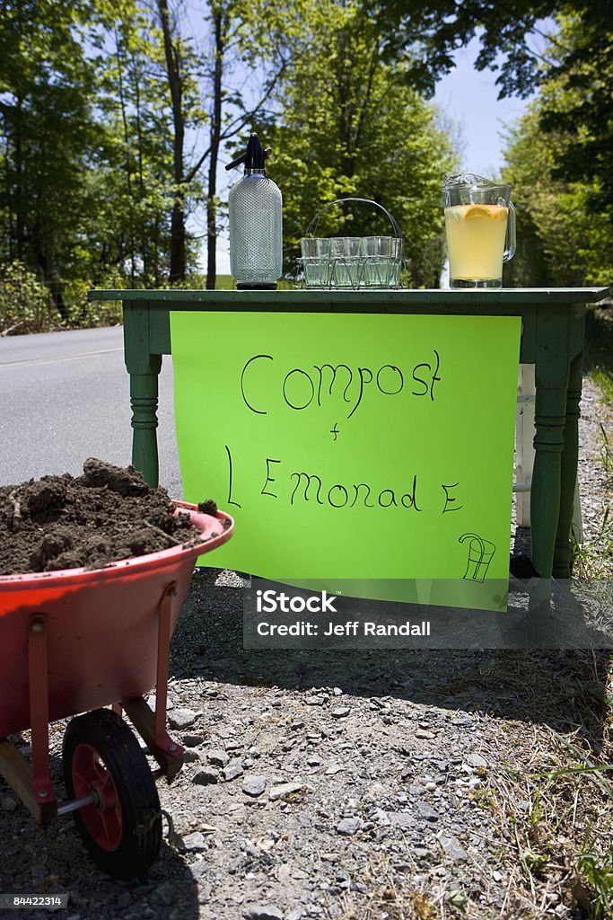 Lemonade and compost stand on country road  Absence Stock Photo