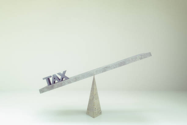 istock 3d rendering of Tax blocks on balance board 844230180