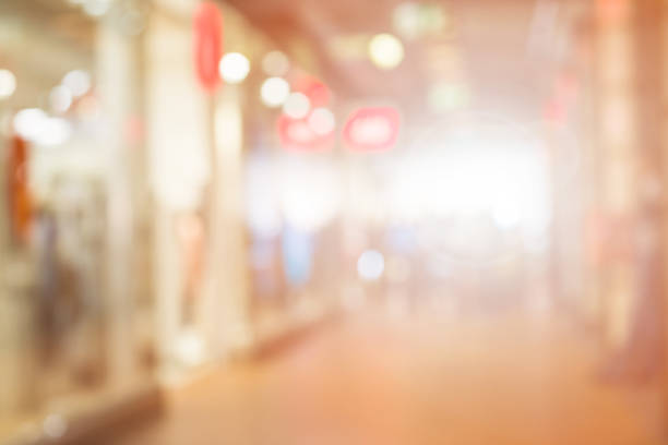 istock Abstract blur shopping mall background with people. Empty floor for copy space and bokeh. Vintage tone 844232676