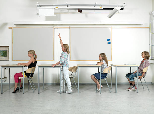 four students in a classroom - studenter sweden bildbanksfoton och bilder