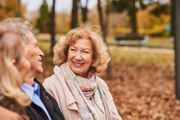 istock Three senior friends at the park. 844236068