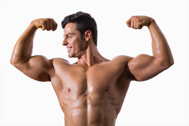 istock Portrait of a muscular young man flexing muscles 844238778