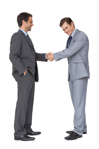 istock Happy business team shaking hands 844243102