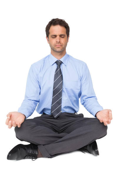 istock Zen businessman meditating in yoga pose 844245268