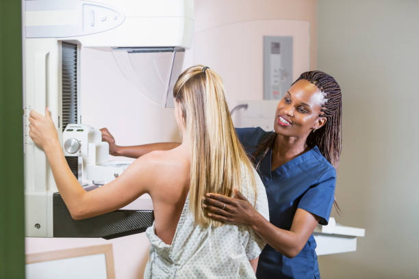 Woman getting mammogram stock photo