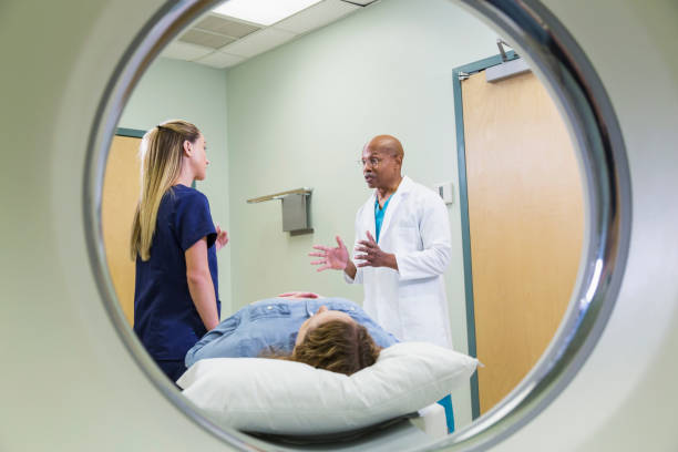istock Doctor and nurse with patient having CT scan 844272334