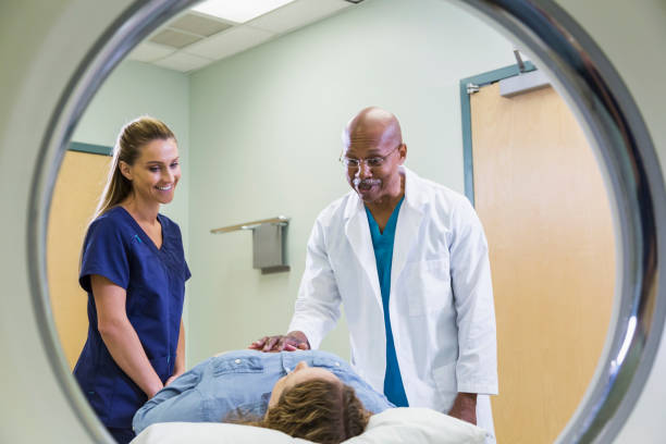 istock Doctor and nurse with patient having CT scan 844272398