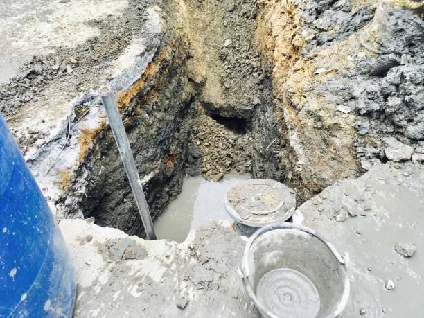istock Construction Site with Drains and Sewers on The Road 844274602