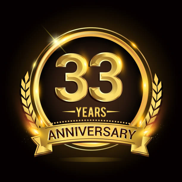 33rd golden anniversary icon, with shiny ring and gold ribbon, laurel wreath isolated on black background, vector design 33rd golden anniversary icon, with shiny ring and red ribbon, laurel wreath isolated on black background, vector design number 33 stock illustrations