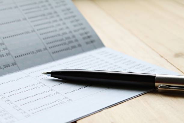 istock Saving account book or financial statement on desk table 844283656