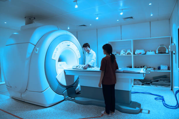 istock veterinarian doctor working in MRI scanner room 844284970