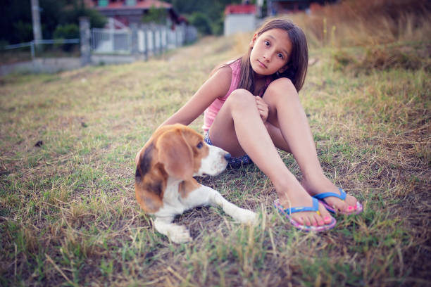 istock Happy girl outdoors with his dog 844297176
