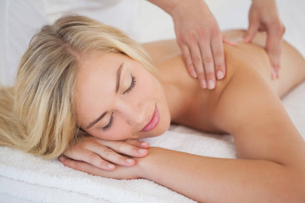 istock Pretty blonde enjoying a massage 844299958